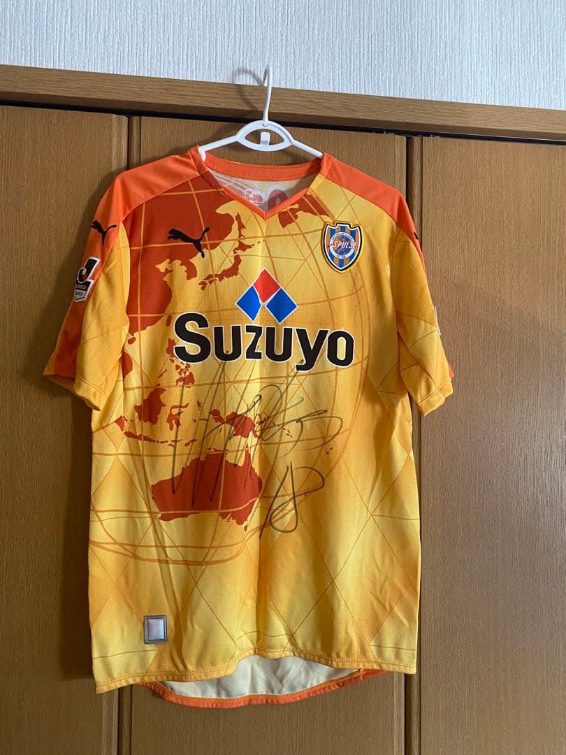 清水エスパルス ユニホーム未使用品タグ付き。ピーターウタカ選手直筆サイン入り。