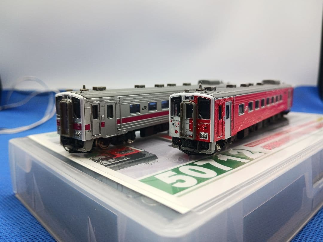 GM 50712 30408 地球探索鉄道花咲線ラッピングトレイン ピンク帯2両