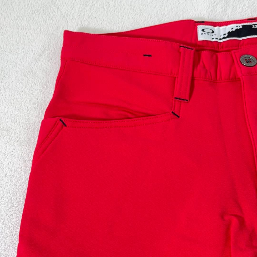 タグ付美品【OAKLEY】ゴルフパンツ 撥水 防寒 裏起毛 ロゴ刺繍 赤系 32