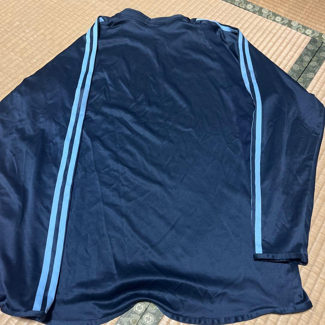 サッカーウェア二枚まとめ売りマンチェスターU Lサイズ　レアル・マドリード2XO