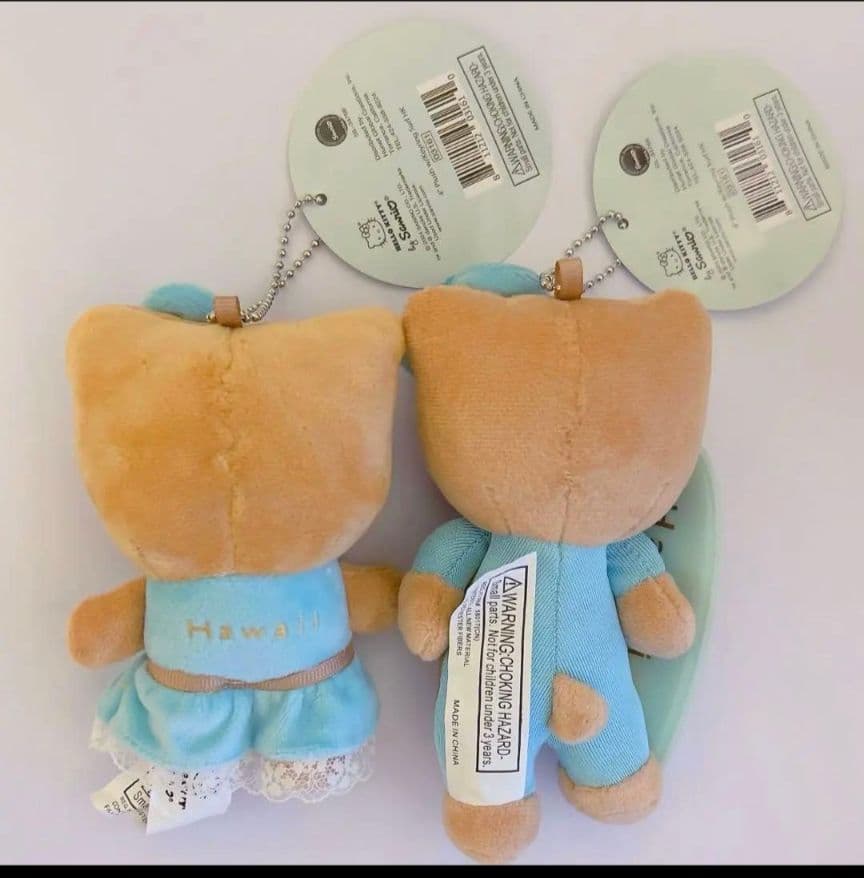 ハローキティ　日焼け　カハラホテル　ブルードレス　サーフボード　マスコット